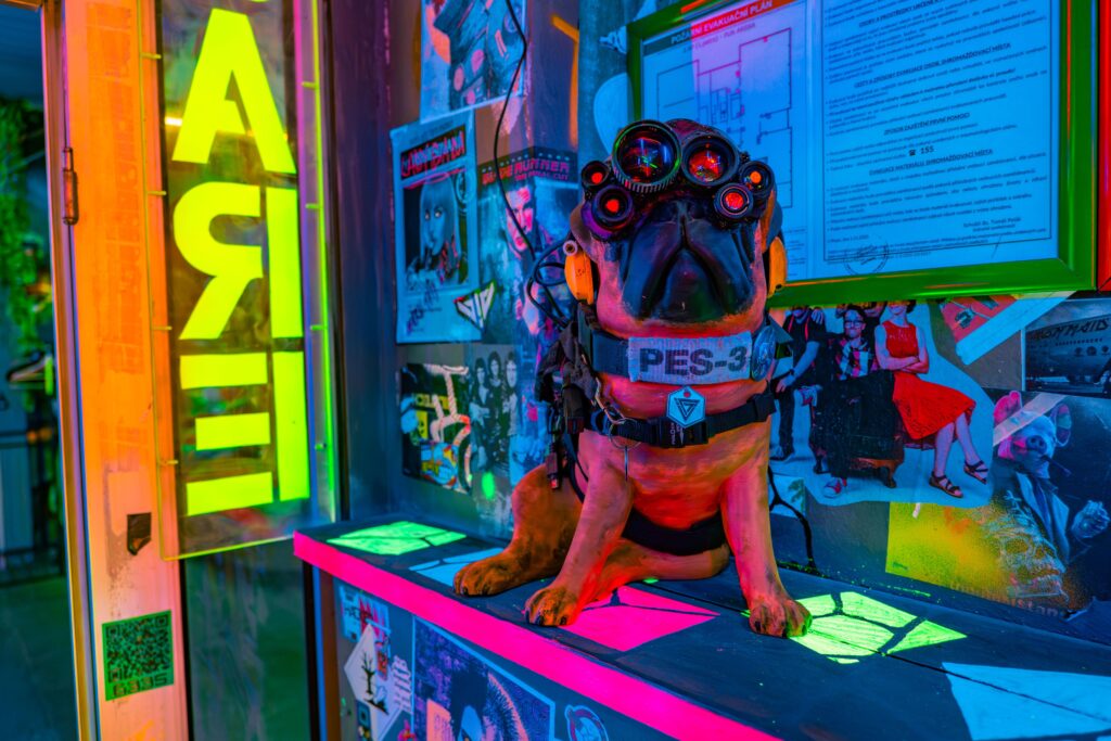 Meet the local security at our cyberpunk district in Prague. PES-3 is fully interactive—equipped with motion sensors, he barks and talks to anyone trying to sneak past the neon gate. 🦾🐶