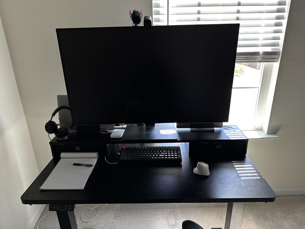 43” monitor takes up whole desk — thinking vertical side monitor on arm, looking for ideas