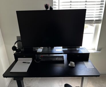43” monitor takes up whole desk — thinking vertical side monitor on arm, looking for ideas
