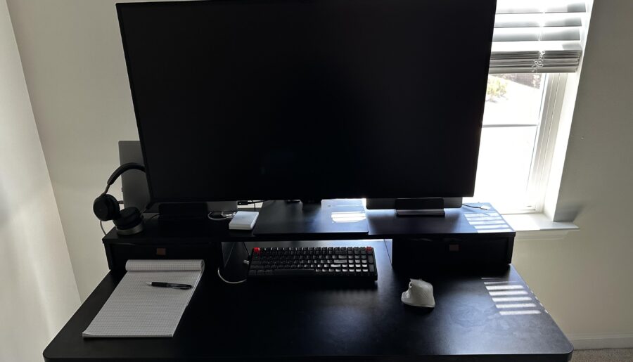 43” monitor takes up whole desk — thinking vertical side monitor on arm, looking for ideas