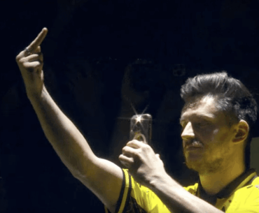 In the souvenir charm Strikes Back someone is holding a sign that says "Apex kisses boys"