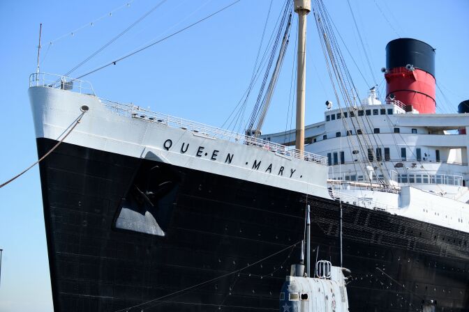 A shot of an ocean liner marked as the "Queen Mary."