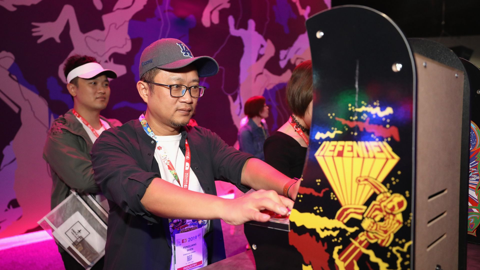 Defender at 45: How an icon of space gaming is in danger of being lost to history Gaming industry personnel Fengliang Shen plays 'Defender' during the E3 Video Game Convention at the Los Angeles Convention Center on June 11, 2019 in Los Angeles, California.