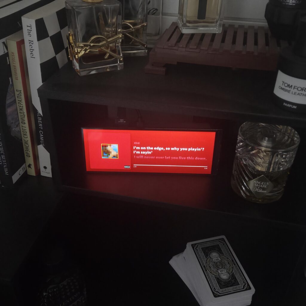 Built a small desk display for music with synced lyrics. Would you use this?