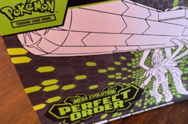 Pokemon TCG Perfect Order Elite Trainer Box on a wooden table