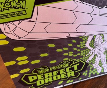 Pokemon TCG Perfect Order Elite Trainer Box on a wooden table