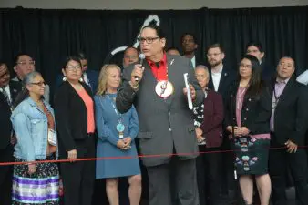 Ernie Stevens speaking at the opening