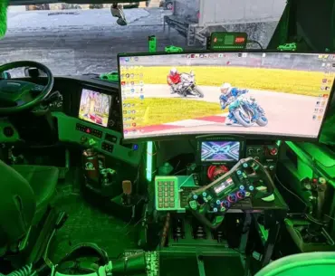 One truck driver installed a $6,000 racing simulator and Gaming PC in his cab to run Virtual laps during highway traffic stops and mandatory rest periods