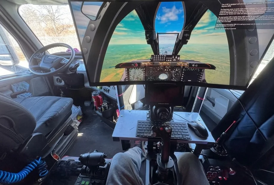 One truck driver installed a $6,000 racing simulator and Gaming PC in his cab to run Virtual laps during highway traffic stops and mandatory rest periods