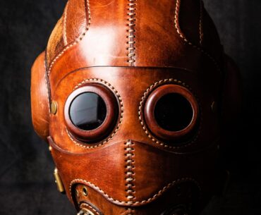 The Dust Angel handmade leather respirator helmet inspired by retrofuturism and dieselpunk