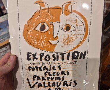 So! I found this poster in a nostalgia store today, and I was like, "Hey! Isn't that..?!" Used Google translate, so it's a poster for some event back in the day. But, does anybody know what the significance is about the drawing of that face?