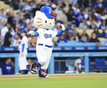 Mascot dressed up like the brand Hello Kitty prepares to throw out the ceremonial first pitch during a game between the Los Angeles Dodgers and the New York Mets at Dodger Stadium in Los Angeles, California, US, April 13, 2026. (AFP Photo)