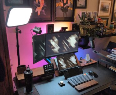 My work and gaming setup next to my wife's setup