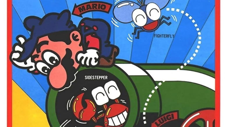 Mario peeks in a cannon with a crab waving inside of it on the cover art for Mario Bros.