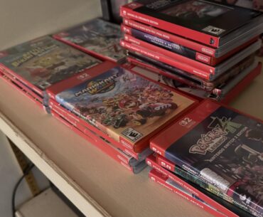 My son categorized our games today. Apparently the tall pile is a single category called “murder games”