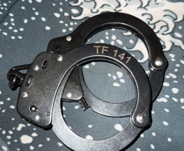 [COD] Custom engraved handcuffs I got for work. My initials are “TF” so I had to add the 141!