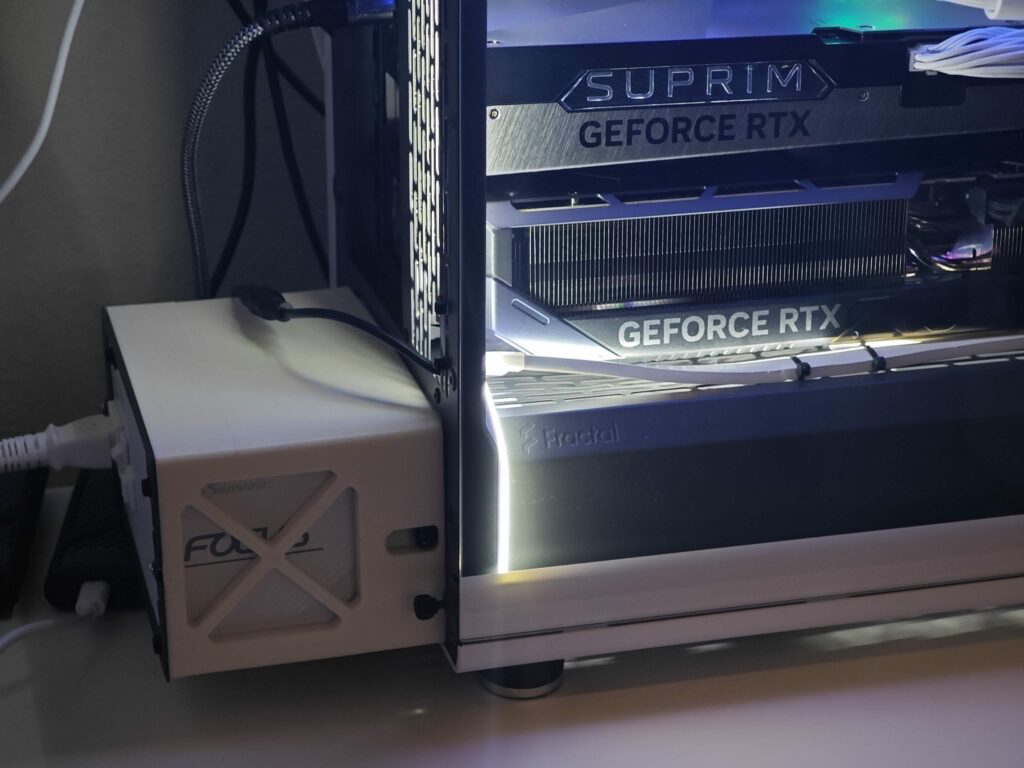 3D printed a little diaper to hold the PSU and unblock airflow to the lower RTX 5090. Case is a Fractal North XL. Is Diapercore the next PC Gaming Aesthetic?