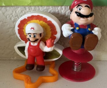 My Happy Meal Mario toy from when I was a kid VS my son's Happy Meal Mario