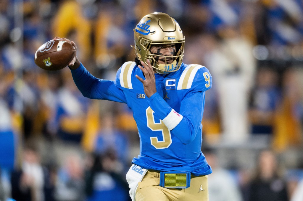 UCLA quarterback Iamaleava throwing a football.