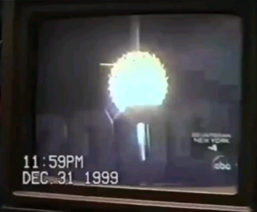 A Guy Checks His Computer On New Year’s Night In 2000