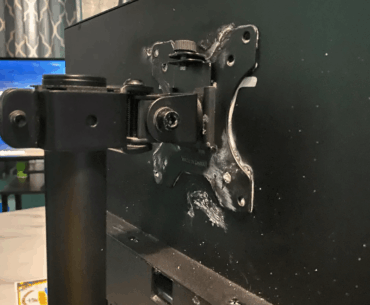 Mom used gorilla glue to mount a VESA plate on her monitor, still working after 5 years!