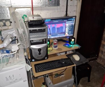 This is my "Digitizer" machine, it has 2 simple purposes: Open old office documents and print them below, and to digitize cassettes. The CPU cooler died a while ago, hense the giant fan. Why not upgrade it? Doesnt need it. It does its job.