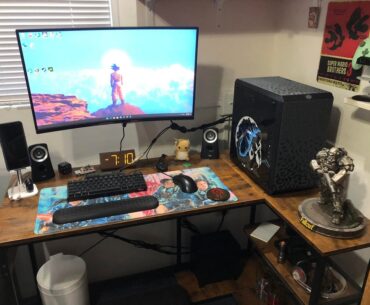 No overall theme, amazon furniture, cheap peripherals. Sick mousepad and godzilla vinyl though.