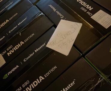 Found a literal time capsule from 2008. 16x factory sealed NVIDIA CM 690s. My inner teenage gamer is screaming.
