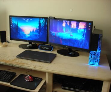 Massively upgraded my setup from last time i posted here!, picked up a couple new monitors off marketplace for $20 and made this custom wooden phone stand!
