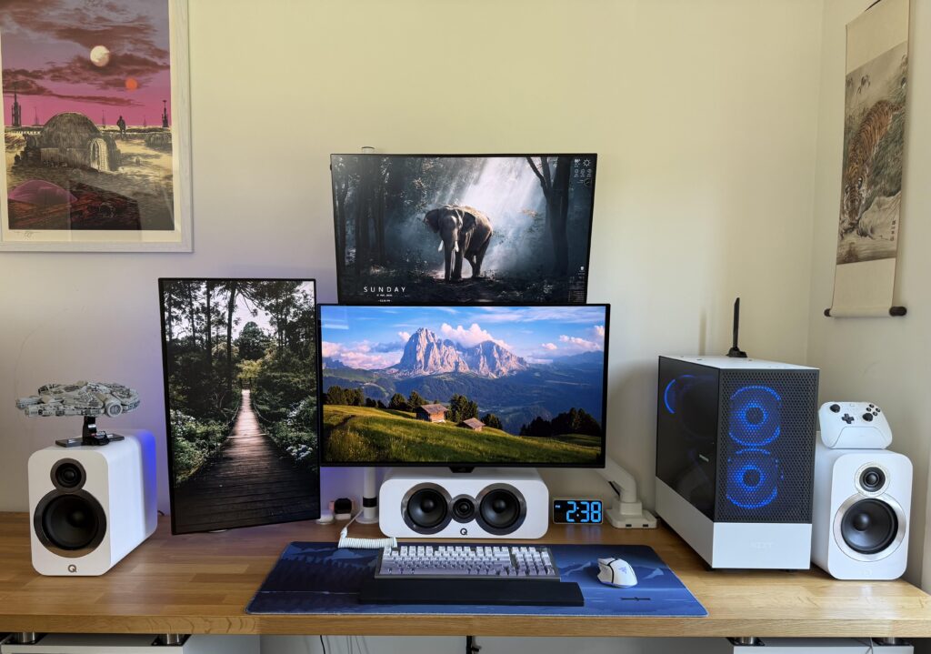 My attempt at a clean and balanced triple-monitor setup My attempt at a clean and balanced triple-monitor setup