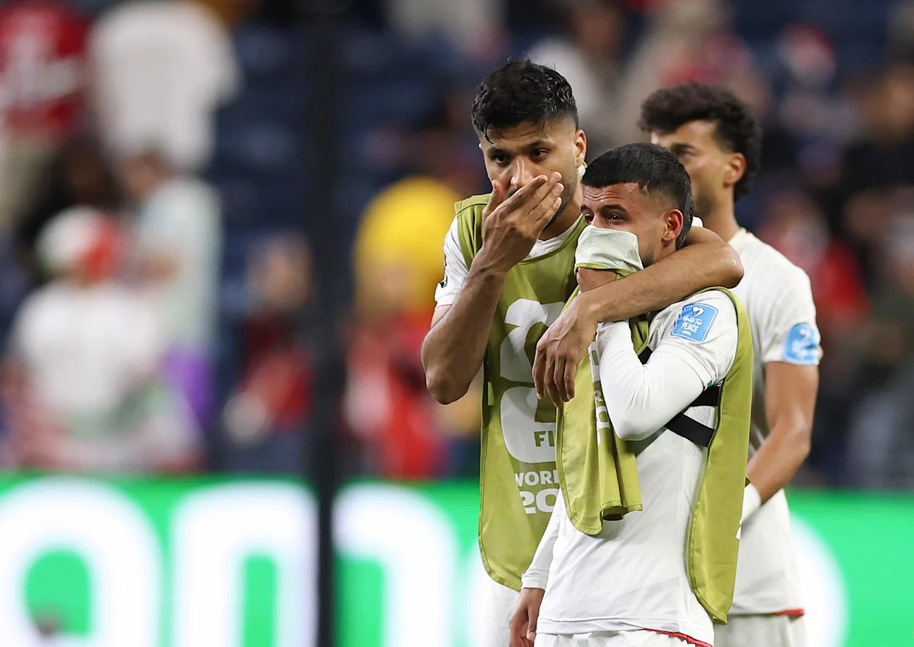 SEATTLE, WASHINGTON - JUNE 26: Mohammad Mohebbi #8 and Mehdi Ghayedi #10 of IR Iran react after the 1-1 draw during the FIFA World Cup 2026 Group G match between Egypt and IR Iran at Seattle Stadium on June 26, 2026 in Seattle, Washington. (Photo by Richard Heathcote/Getty Images)