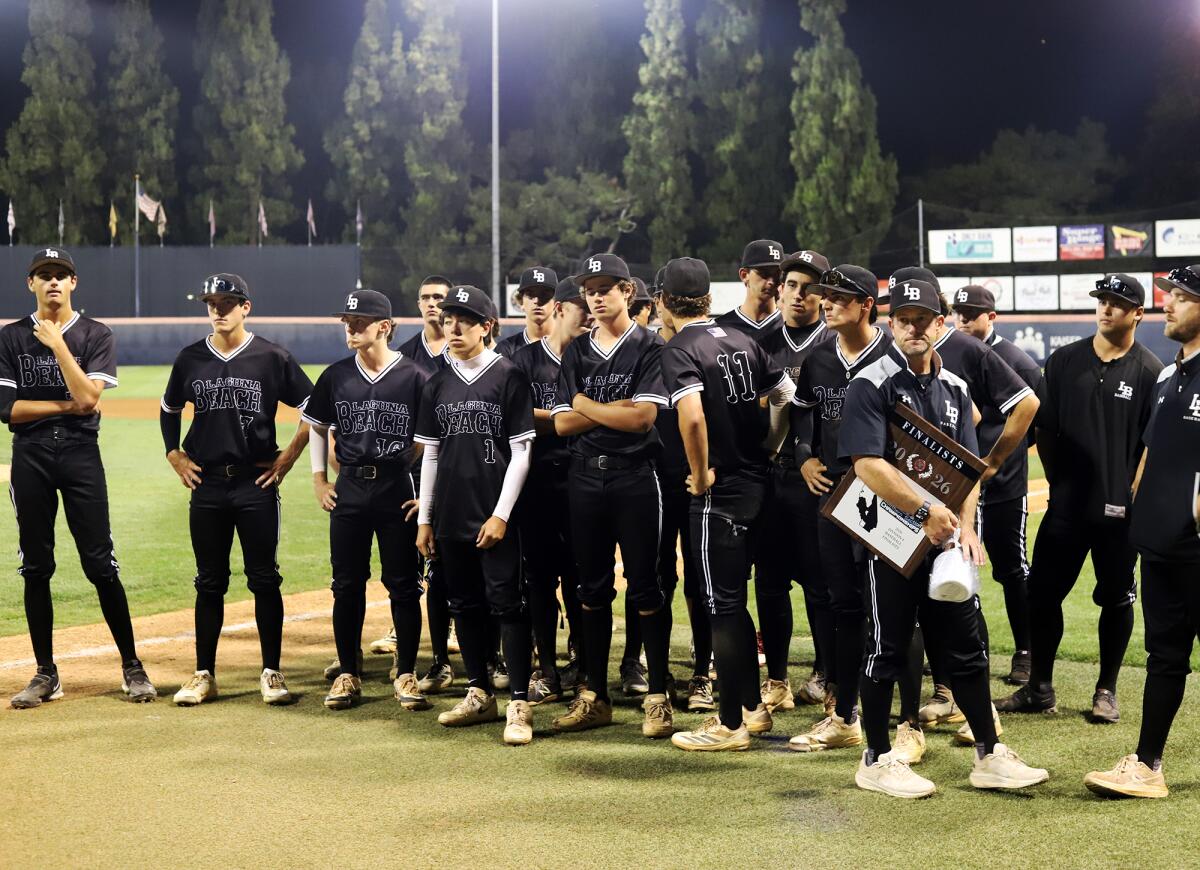 Laguna Beach baseball head coach Ryan Belanto and the Breakers accept the CIF runner-up plaque.