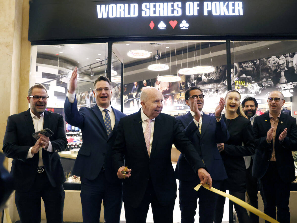 World Series of Poker’s legacy on display at new flagship store inside Strip casino | Casinos & Gaming Las Vegas legend Jack Binion, center, participates in a ribbon-cutting ceremony for the World S ...