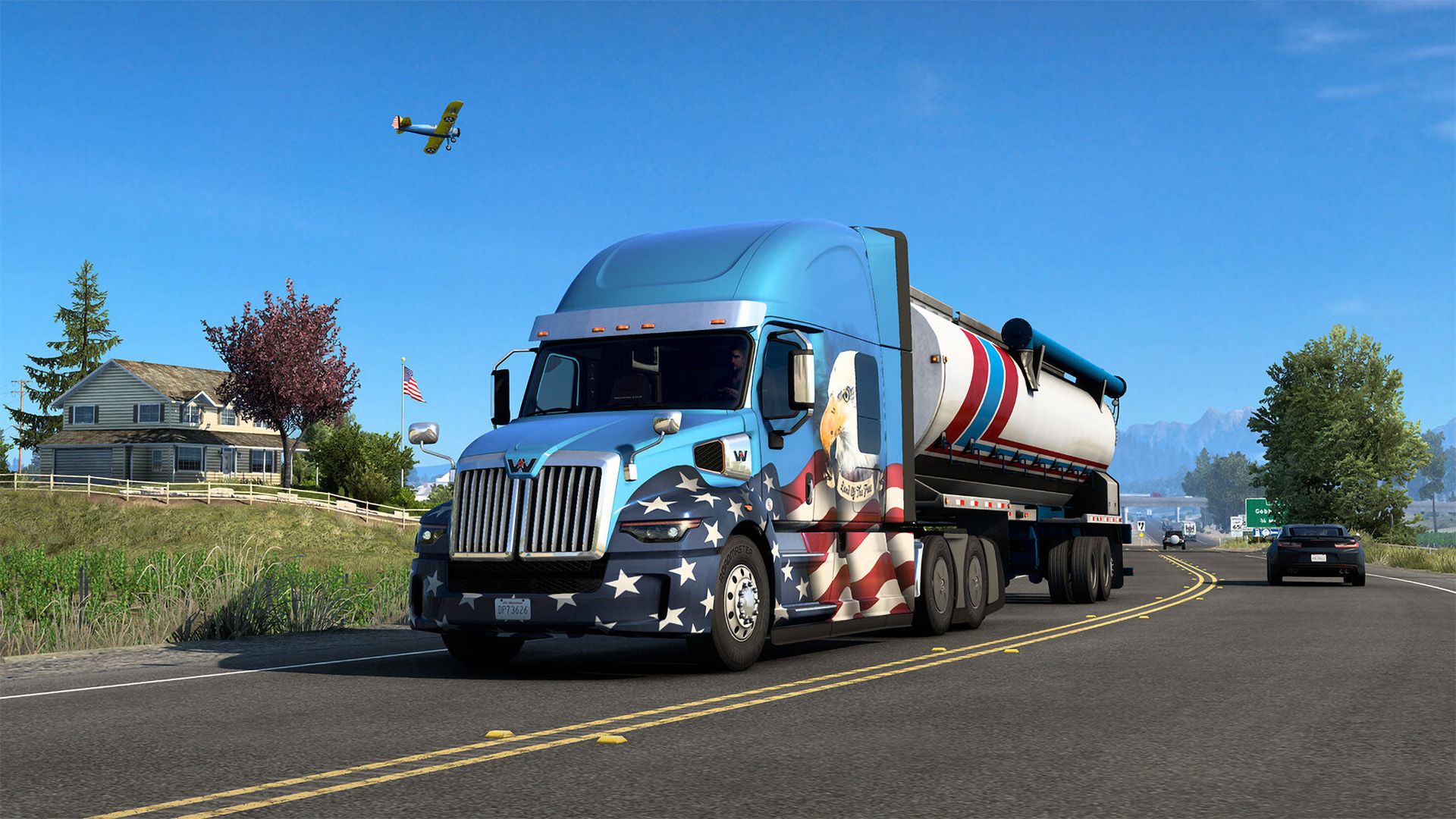 The world’s most popular truck simulator games will be much easier to learn with a future patch for Windows and Steam Deck A virtual semi-truck with an American flag design on a highway, with a house, car, and airplane in the gameplay scene of American Truck Simulator.
