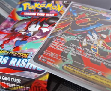 Pokemon Chaos Rising card and booster pack laid out on a dark background