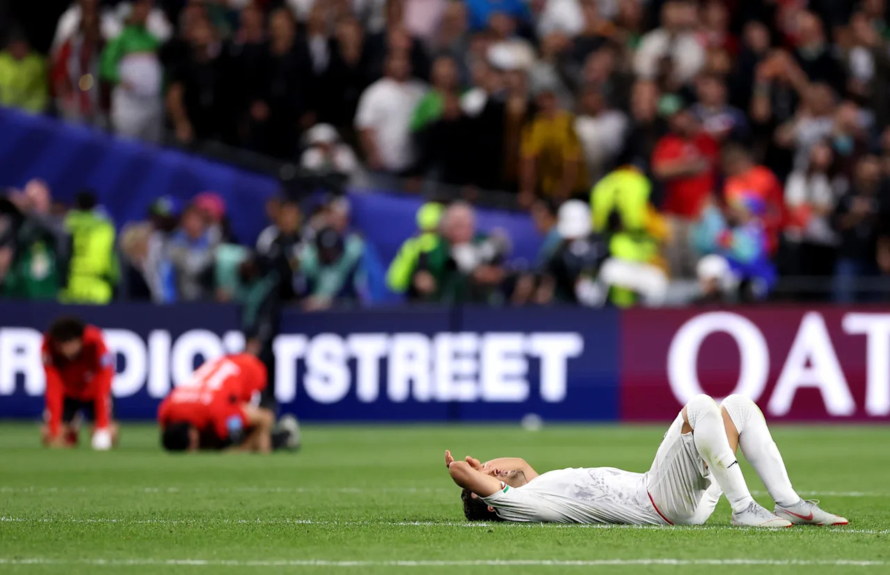 SEATTLE, WASHINGTON - JUNE 26: Shoja Khalilzadeh #4 of IR Iran reacts after the 1-1 draw during the FIFA World Cup 2026 Group G match between Egypt and IR Iran at Seattle Stadium on June 26, 2026 in Seattle, Washington. (Photo by Richard Heathcote/Getty Images)