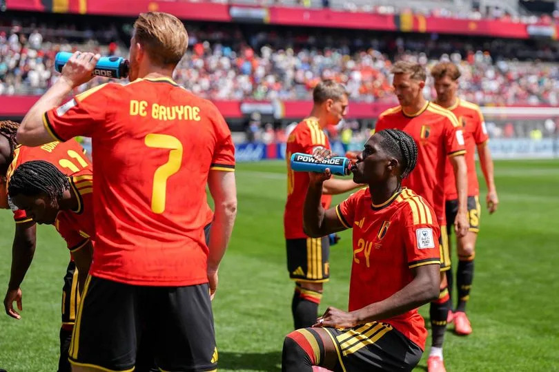 Belgium players hydrate during a break before the 2026 FIFA World Cup Group G match