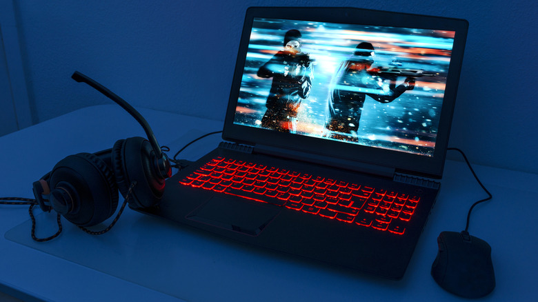 A gaming laptop set up on a desk