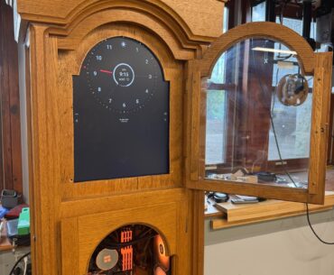 My engineering teacher challenged me to build a PC in his grandfather clock
