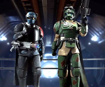Two armored soldiers in futuristic gear stand in a dark, metallic corridor; one wears blue and black armor, the other wears green and tan camouflage.