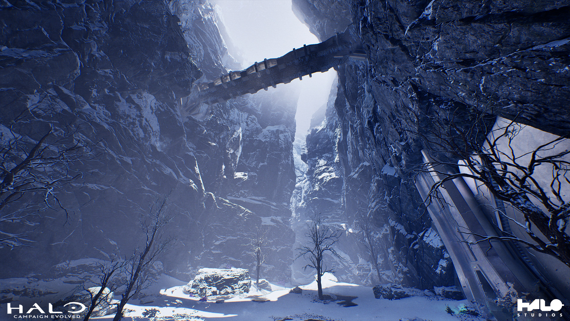 Wintry scenery from the newly rebuilt "Assault on the Control Room" mission. A bridge spans a rocky chasm strewn with fresh snow.