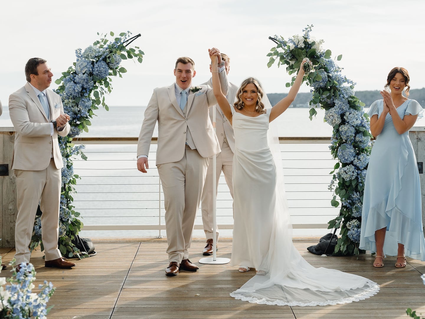 Elena and Tim's wedding and reception at the Beauport Hotel Gloucester was their second celebration. The couple had officially married in a micro-ceremony in 2025 before the birth of their daughter.