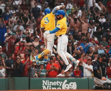 Right fielder Wilyer Abreu (right) and center fielder Ceddanne Rafaela celebrate Rafaela's go-ahead home run in the seventh on Saturday.