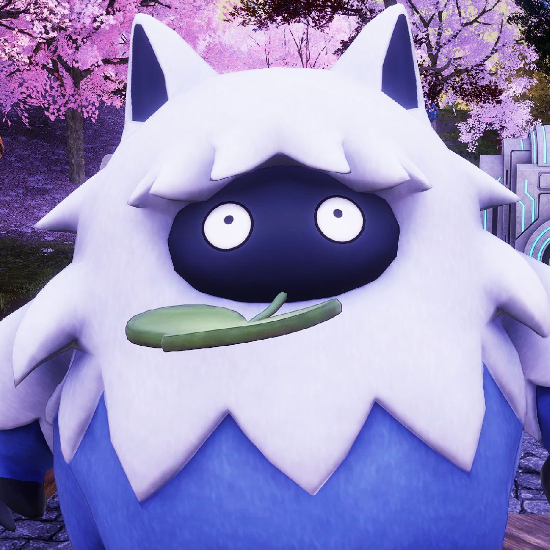 Palworld - Wumpo, a bumbling, large blue and white pal with cat ears and a leaf in its mouth.
