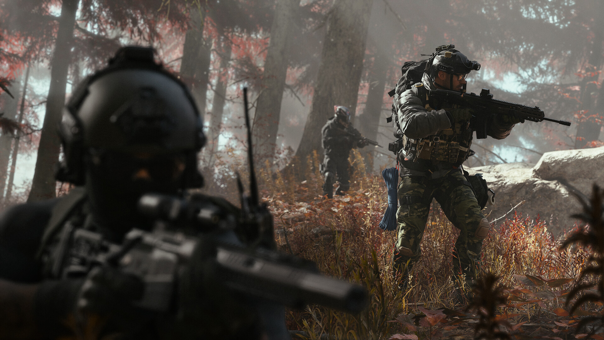 Modern Warfare 4 screenshot showing three armed soldiers moving tactically through a forest in the daytime