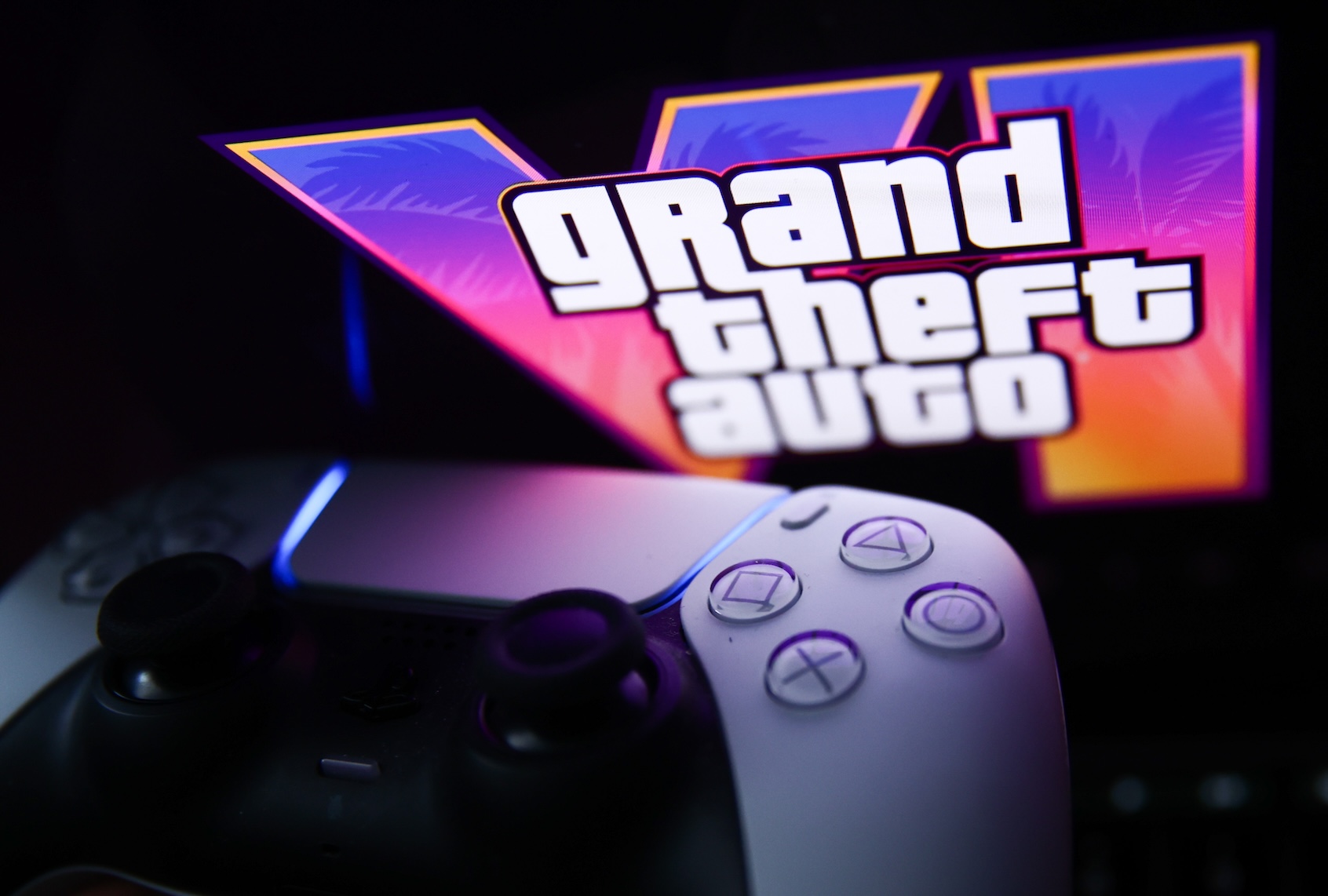 Gaming is in serious trouble. GTA VI may be the nail in the coffin GTA VI logo from the trailer displayed on a laptop screen and PlayStation DualSense controller. (Photo by Jakub Porzycki/NurPhoto via Getty Images)