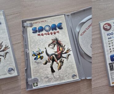 I found the SPORE expansion CD on the bookshelf!