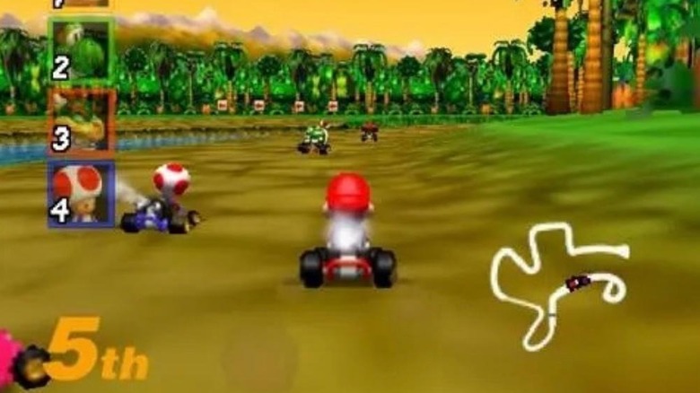 Mario drives on a road through a jungle in Mario Kart 64