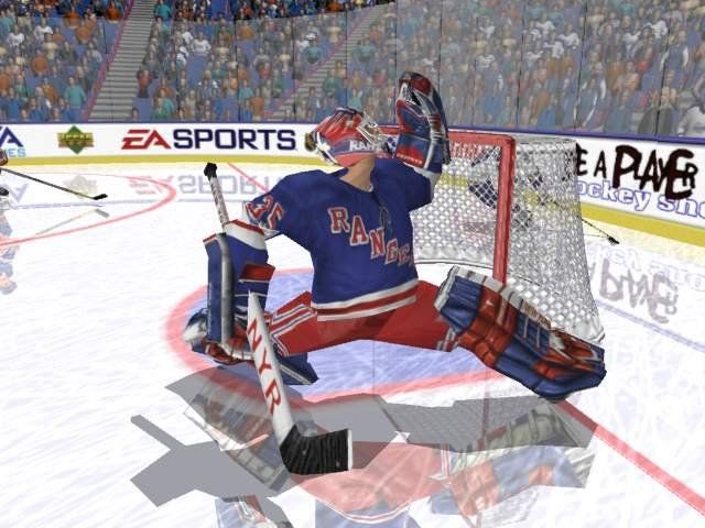 A goalie stretches their legs in NHL 2002