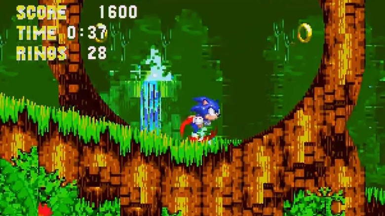 Sonic runs towards a loop in 